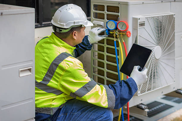 Professional Air Conditioning Repair technician working in Bear River City, UT